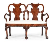 A GEORGE II BURR WALNUT AND WALNUT CHAIR BACK SETTEE, CIRCA 1740