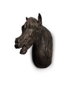 AN UNUSUAL CARVED AND PAINTED WOOD WALL MOUNT, IN THE FORM OF THE HEAD OF A HORSE