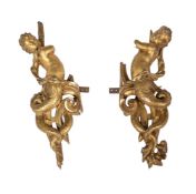 A PAIR OF CARVED GILTWOOD MOUNTS, 18TH CENTURY
