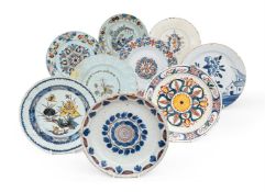 A GROUP OF EIGHT ENGLISH DELFT PLATES, 18TH CENTURY