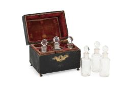 A GEORGE II AND BRASS MOUNTED LEATHER SCENT OR PERFUME BOTTLE CASKET, SECOND QUARTER 18TH CENTURY