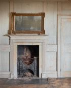 A GEORGE II CARVED GILTWOOD AND GESSO MIRROR, CIRCA 1730