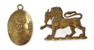 A BRONZE DOUBLE SIDED HERALDIC LION, LATE 18TH OR EARLY 19TH CENTURY