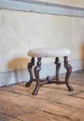 A QUEEN ANNE CARVED BEECH STOOL, CIRCA 1715