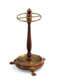 A MAHOGANY AND BRASS CIRCULAR STICK STAND, IN REGENCY STYLE, 20TH CENTURY