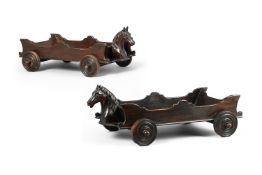A MATCHED PAIR OF UNUSUAL MAHOGANY 'HORSE HEAD' BREAD TROLLEYS, 19TH CENTURY