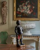 A RARE ENGLISH CARVED AND POLYCHROME DECORATED TOBACCONISTS FIGURE, 17TH CENTURY