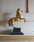 A GILT BRONZE MODEL OF A REARING HORSE, POSSIBLY FRENCH, 18TH CENTURY