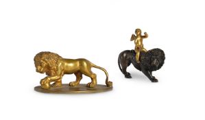 TWO BRONZE MODELS OF LIONS