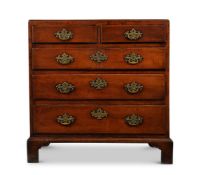 A GEORGE III FRUITWOOD CHEST OF DRAWERS, CIRCA 1770