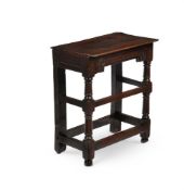 AN UNUSUAL CHARLES I JOINED OAK TABLE OR STOOL, EARLY 17TH CENTURY