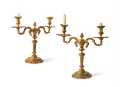 A PAIR OF REGENCE BRONZE CANDLESTICKS, CIRCA 1720