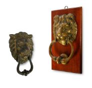 TWO BRASS DOOR KNOCKERS, EARLY 19TH CENTURY AND LATER
