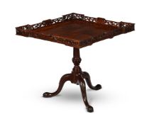 AN UNUSUAL CARVED MAHOGANY TRIPOD TABLE, CONSTRUCTED FROM 18TH CENTURY AND LATER ELEMENTS