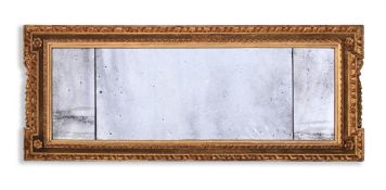 A GEORGE II CARVED GILTWOOD AND GESSO MIRROR, CIRCA 1730
