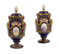 A PAIR OF SEVRES STYLE PORCELAIN URNS AND COVERS, 19TH CENTURY