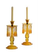 A PAIR OF LARGE AMBER CUT GLASS TABLE LUSTRES, LATE 19TH CENTURY