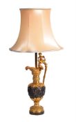 A GILT AND PATINATED BRONZE NEOCLASSICAL EWER, CONVERTED TO A LAMP, PROBABLY FRENCH, NAPOLEON III