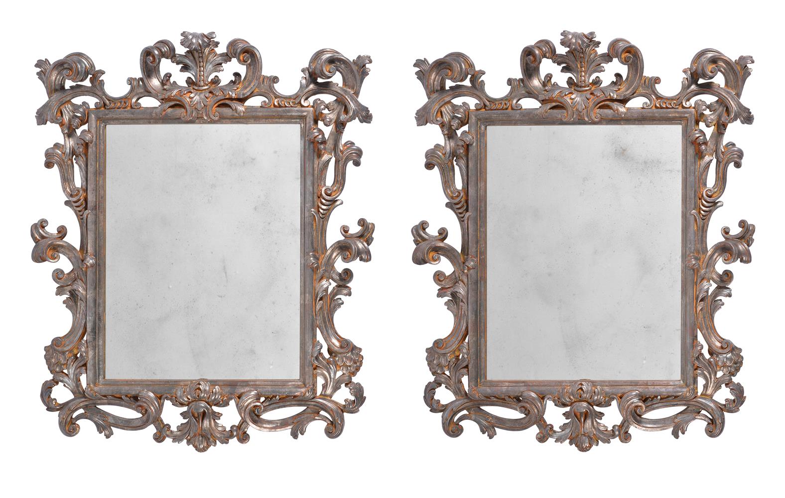 A PAIR OF ORNATE SILVERED WOOD WALL MIRRORS, ITALIAN, 20TH CENTURY