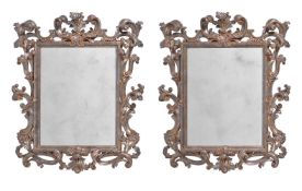A PAIR OF ORNATE SILVERED WOOD WALL MIRRORS, ITALIAN, 20TH CENTURY