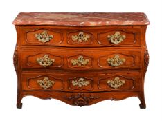 A LOUIS XV PROVINCIAL WALNUT, GILT METAL MOUNTED, AND MARBLE TOPPED COMMODE, MID 18TH CENTURY
