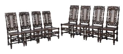 A SET OF EIGHT WALNUT HIGH CANE BACK DINING CHAIRS, IN CHARLES II STYLE, 20TH CENTURY