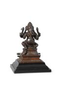 AN INDIAN BRONZE FIGURE OF GANESH, 19TH CENTURY