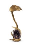 ATTRIBUTED TO JACQUES DUVAL-BRASSEUR; A GILT METAL AND AMETHYST 'COBRA' TABLE LAMP; 20TH CENTURY