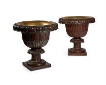 Y A PAIR OF MAHOGANY CIRCULAR WINE COOLERS, MODERN