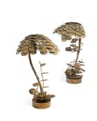 ATTRIBUTED TO JACQUES DUVAL-BRASSEUR; A PAIR OF GILT METAL TABLE LAMPS; SECOND HALF 20TH CENTURY