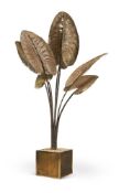 ATTRIBUTED TO JACQUES DUVAL-BRASSEUR; A FLOOR STANDING GILT METAL MODEL OF A BANANA PLANT