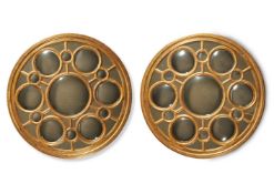 A PAIR OF GILTWOOD MULTI CONVEX CIRCULAR 'ADAM' WALL MIRRORS, MODERN