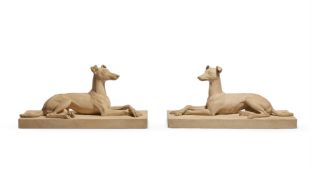 A PAIR OF COADESTONE (ENGLSH TERRACOTTA) MODELS OF RESTING WHIPPETS, MODERN