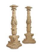A PAIR OF VICTORAIN PAINTED PLASTER TORCHERES, MID 19TH CENTURY
