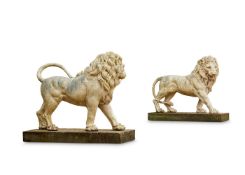A PAIR OF COADESTONE (ENGLISH TERRACOTTA) STANDING LIONS, MODERN