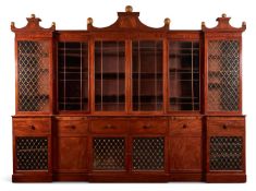A MAHOGANY BREAKFRONT SECRETAIRE LIBRARY BOOKCASE, EARLY 19TH CENTURY