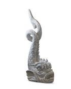 A PLASTER FIGURE OF A DOLPHIN, MODERN