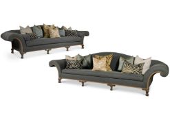 A PAIR OF UPHOLSTERED SCROLL END SOFAS, MODERN