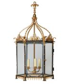 A BLACK AND GILT BRASS THREE LIGHT HEXAGONAL LANTERN, MODERN