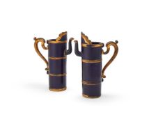 A rare pair of Tibetan inspired Chinese aubergine-blue glazed porcelain ewers