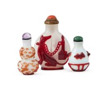 Y A Chinese miniature red glass overlay snuff bottle