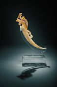 A Chinese calcified jade 'Dragon and phoenix' pendant