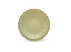 A Chinese 'Longquan' celadon carved and moulded dish