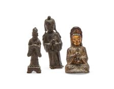 A Chinese bronze parcel-gilt figure of Guanyin and child