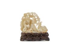 A Chinese pale celadon jade 'Longevity' carving