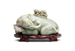 A large Chinese celadon jade 'Elephant and boy' water pot and cover