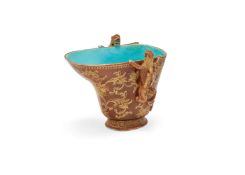 A Chinese moulded iron-red and turquoise glazed libation cup