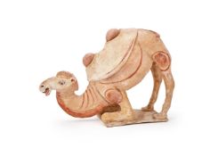 A Chinese painted pottery model of a crouching Bactrian Camel