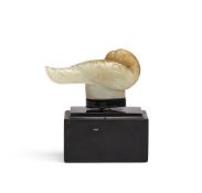 A Chinese pale celadon and russet jade bird form finial