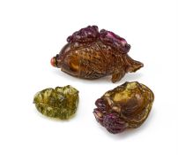 Y A Chinese tourmaline 'Carp' snuff bottle and two small snuff dishes